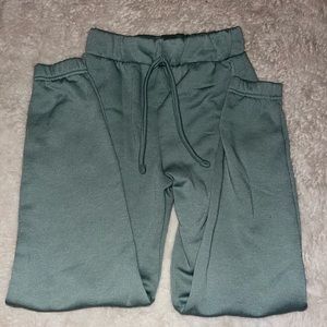 Green sweatpants
